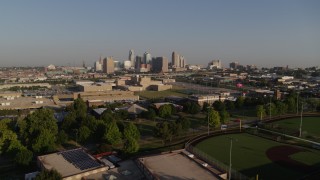 DX0001_001036 - 5.7K aerial stock footage a view of the city skyline of Downtown Kansas City, Missouri while descending