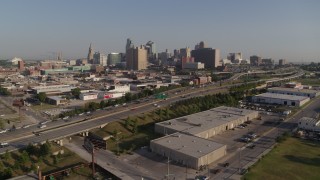 DX0001_001038 - 5.7K aerial stock footage flyby a freeway east of city office buildings in Downtown Kansas City, Missouri