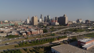 DX0001_001040 - 5.7K aerial stock footage flyby a freeway interchange east of city office buildings in Downtown Kansas City, Missouri
