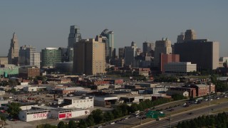 DX0001_001048 - 5.7K aerial stock footage of a city office building and skyscrapers in Downtown Kansas City, Missouri