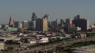 DX0001_001059 - 5.7K aerial stock footage flyby the city's skyline from east of the freeway in Downtown Kansas City, Missouri