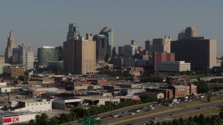 DX0001_001060 - 5.7K aerial stock footage slowly flyby the city's skyline, seen from east of the freeway in Downtown Kansas City, Missouri
