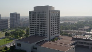 DX0001_001063 - 5.7K aerial stock footage of circling an office building in Kansas City, Missouri