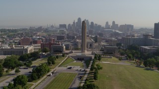 DX0001_001069 - 5.7K aerial stock footage circle the WWI memorial in Kansas City, Missouri, with a view of the downtown skyline