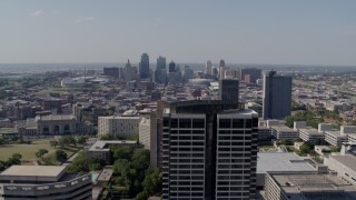 DX0001_001083 - 5.7K aerial stock footage of the city skyline seen from Crown Center, Downtown Kansas City, Missouri