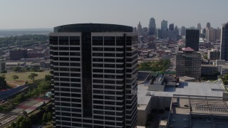 DX0001_001094 - 5.7K aerial stock footage of orbiting a Crown Center office building in Kansas City, Missouri