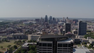 DX0001_001099 - 5.7K aerial stock footage fly away from Downtown Kansas City, Missouri and reveal Crown Center office building
