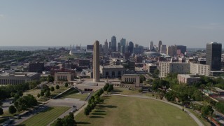 DX0001_001103 - 5.7K aerial stock footage pass by the WWI memorial for view of Downtown Kansas City, Missouri skyline