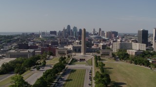 DX0001_001105 - 5.7K aerial stock footage of the WWI memorial and the Downtown Kansas City, Missouri skyline