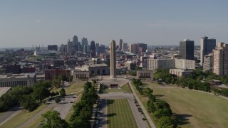 DX0001_001107 - 5.7K aerial stock footage of the WWI memorial and the Downtown Kansas City, Missouri skyline