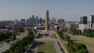 DX0001_001111 - 5.7K aerial stock footage of the WWI memorial and the Downtown Kansas City, Missouri skyline