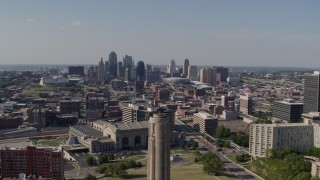 DX0001_001113 - 5.7K aerial stock footage fly away from skyline to reveal the WWI memorial, Downtown Kansas City, Missouri