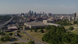 DX0001_001118 - 5.7K aerial stock footage of a government office building and city skyline, Downtown Kansas City, Missouri