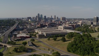 DX0001_001119 - 5.7K aerial stock footage of a government office building and city skyline in background, Downtown Kansas City, Missouri