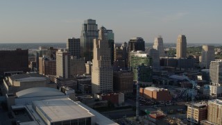 DX0001_001153 - 5.7K aerial stock footage of a reverse view of tall skyscrapers in Downtown Kansas City, Missouri