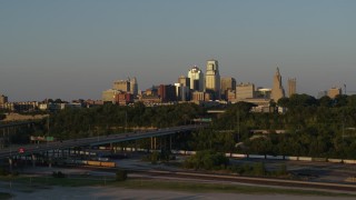 DX0001_001167 - 5.7K aerial stock footage of the skyline at sunset in Downtown Kansas City, Missouri