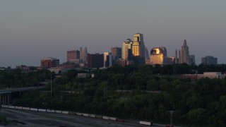 DX0001_001176 - 5.7K stock footage aerial video of city high-rises reflecting the light of the twilight in Downtown Kansas City, Missouri