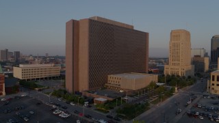 DX0001_001204 - 5.7K aerial stock footage approach a government building at sunrise, Downtown Kansas City, Missouri