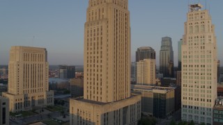 DX0001_001211 - 5.7K aerial stock footage approach city hall at sunrise, Downtown Kansas City, Missouri