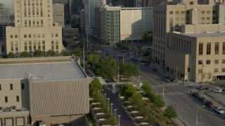 DX0001_001233 - 5.7K aerial stock footage approach and orbit government office building at sunrise, Downtown Kansas City, Missouri