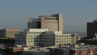 DX0001_001247 - 5.7K aerial stock footage federal courthouse behind government office building at sunrise, Downtown Kansas City, Missouri