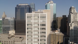 DX0001_001281 - 5.7K aerial stock footage stationary view of a downtown office building at sunrise, Downtown Kansas City, Missouri