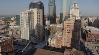 DX0001_001282 - 5.7K aerial stock footage orbit downtown office buildings and high-rises at sunrise, Downtown Kansas City, Missouri