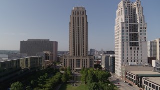 DX0001_001290 - 5.7K aerial stock footage flying toward city hall near a tall skyscraper in Downtown Kansas City, Missouri