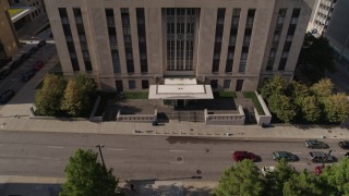 DX0001_001299 - 5.7K aerial stock footage fly away from the entrance to city hall in Downtown Kansas City, Missouri
