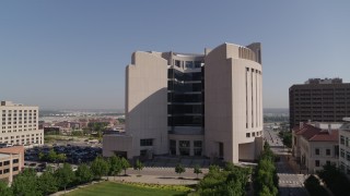 DX0001_001307 - 5.7K aerial stock footage circle the federal courthouse and hover for stationary view in Downtown Kansas City, Missouri