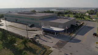 DX0001_001316 - 5.7K aerial stock footage of orbiting an FBI office building in Kansas City, Missouri