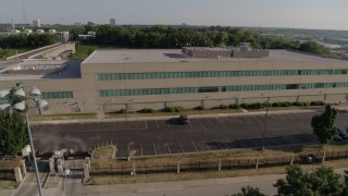 DX0001_001318 - 5.7K aerial stock footage flyby and orbit FBI office building in Kansas City, Missouri