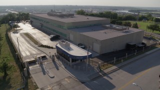 DX0001_001320 - 5.7K aerial stock footage descend by FBI office building in Kansas City, Missouri