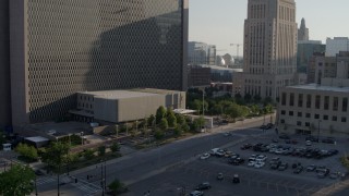 DX0001_001328 - 5.7K aerial stock footage fly away from entrance to a government office building in Downtown Kansas City, Missouri