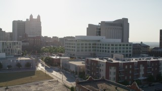 DX0001_001333 - 5.7K aerial stock footage flyby federal courthouse behind office building in Downtown Kansas City, Missouri
