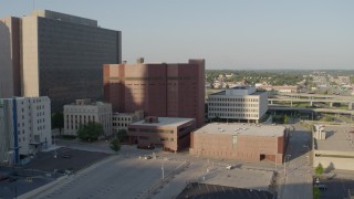 DX0001_001338 - 5.7K aerial stock footage fly toward a city prison in Downtown Kansas City, Missouri