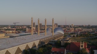 DX0001_001349 - 5.7K aerial stock footage flyby convention center, focus on concert hall at sunset in Downtown Kansas City, Missouri