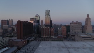 DX0001_001371 - 5.7K aerial stock footage approach skyscrapers at twilight, pause for static view, in Downtown Kansas City, Missouri