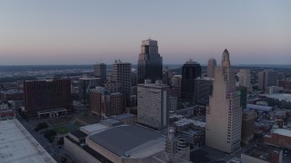 DX0001_001374 - 5.7K aerial stock footage flyby a group of skyscrapers at twilight in Downtown Kansas City, Missouri