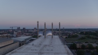 DX0001_001376 - 5.7K aerial stock footage fly over convention center and approach the concert hall at twilight in Downtown Kansas City, Missouri