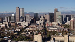 DX0001_001441 - 5.7K aerial stock footage of flying by skyscrapers in Downtown Denver, Colorado