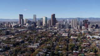 DX0001_001466 - 5.7K aerial stock footage of a stationary and reverse view of the skyline of Downtown Denver, Colorado