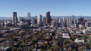 DX0001_001470 - 5.7K aerial stock footage of approaching the skyline of Downtown Denver, Colorado
