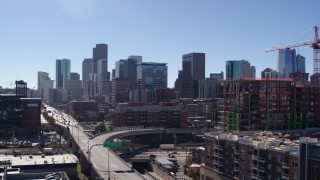 DX0001_001483 - 5.7K stock footage aerial video reveal the city skyline while ascending in Downtown Denver, Colorado