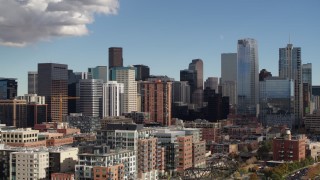 DX0001_001528 - 5.7K aerial stock footage of towering skyscrapers of the city skyline in Downtown Denver, Colorado