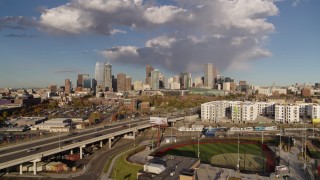 DX0001_001543 - 5.7K aerial stock footage of the city skyline seen from W Colfax Avenue, Downtown Denver, Colorado