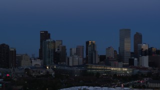 DX0001_001591 - 5.7K aerial stock footage of the city's downtown skyscrapers by convention center at twilight, Downtown Denver, Colorado