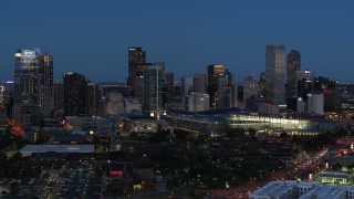 DX0001_001599 - 5.7K aerial stock footage slow flyby of the city's skyscrapers and convention center at twilight, Downtown Denver, Colorado