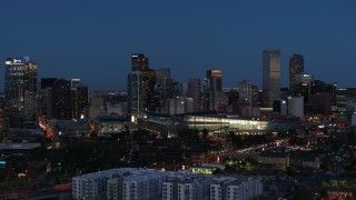 DX0001_001601 - 5.7K aerial stock footage flyby the convention center and city skyline at twilight, Downtown Denver, Colorado