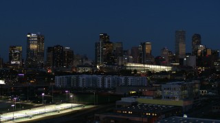 DX0001_001606 - 5.7K aerial stock footage of the city skyline and convention center at twilight, Downtown Denver, Colorado